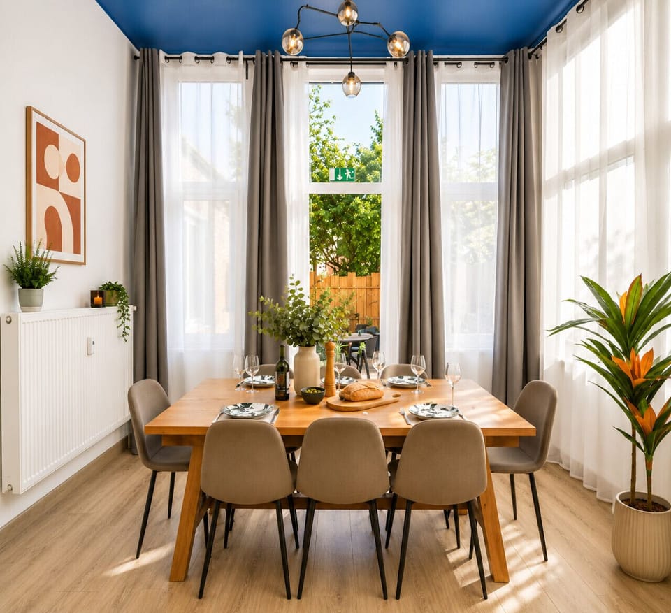 Enjoy memorable meals and quality time together in this beautifully designed dining space featuring comfortable seating, abundant natural light, and a welcoming atmosphere.