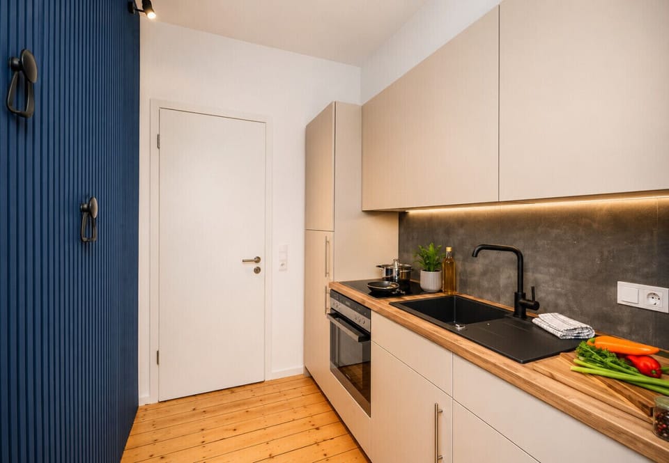 Enjoy the convenience of a stylish, fully equipped kitchen with modern appliances, cooking essentials, and plenty of workspace for preparing meals and snacks.