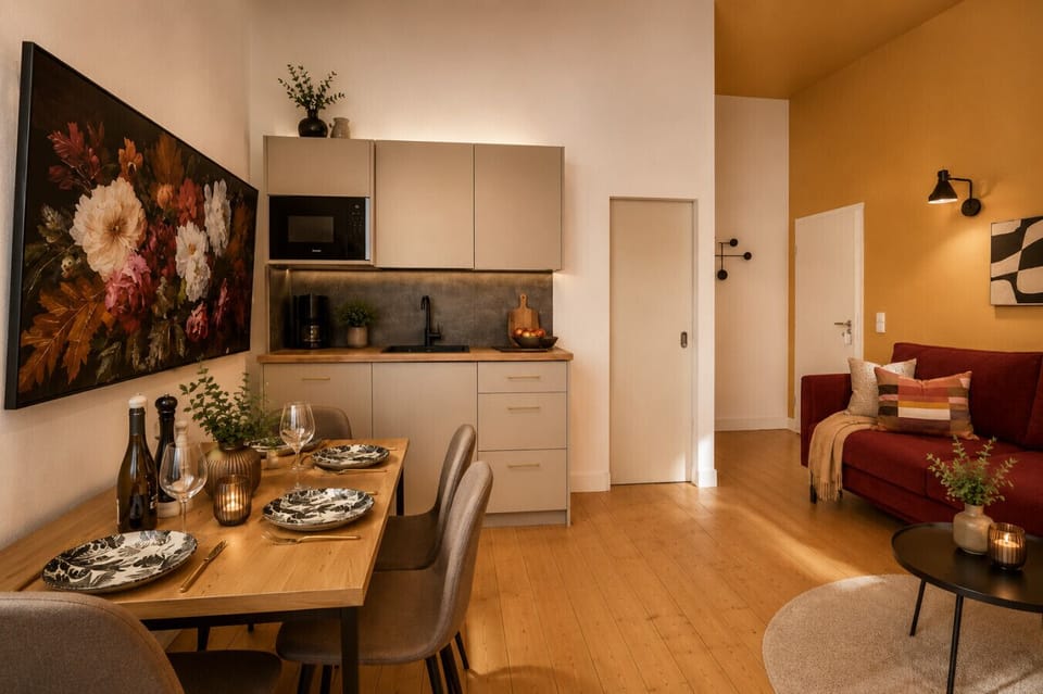 Enjoy the perfect blend of comfort and functionality in this thoughtfully designed studio with a dining area, kitchenette, inviting seating space, and contemporary furnishings throughout.