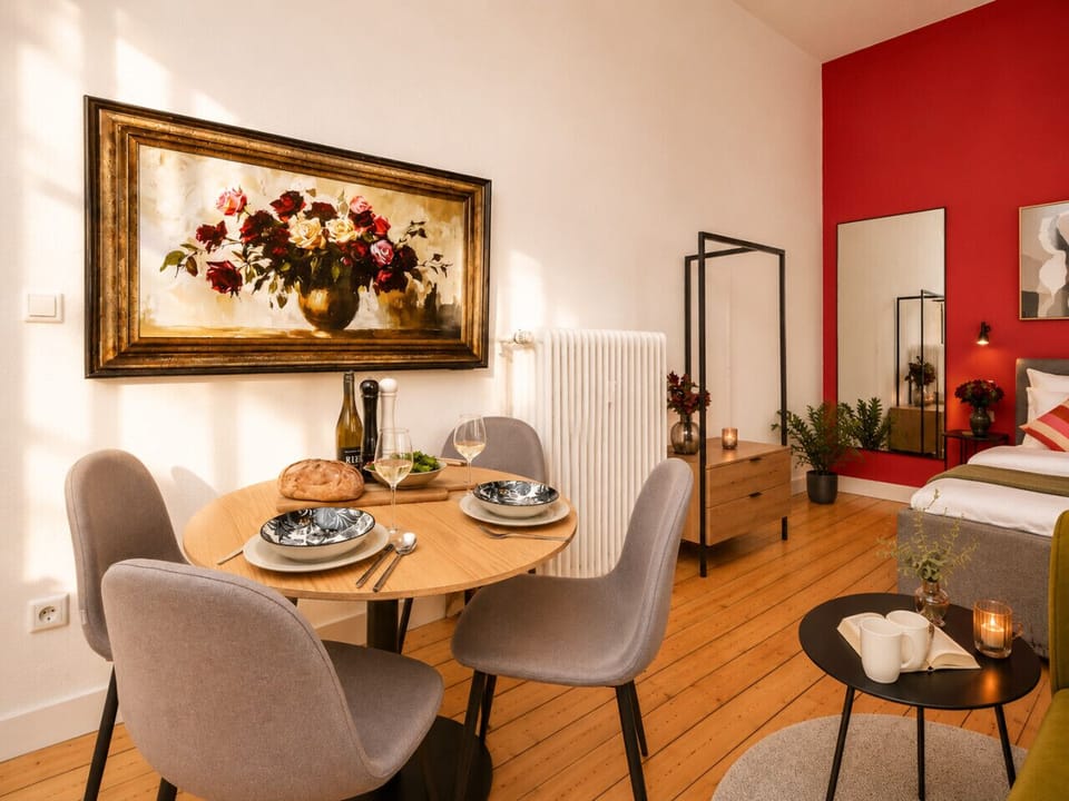 Gather around the dining table for breakfast, dinner, or remote work in this bright and welcoming space, thoughtfully designed for comfort and convenience.