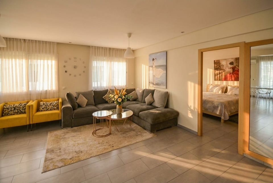 Contemporary Living Room with Adjacent Bedroom