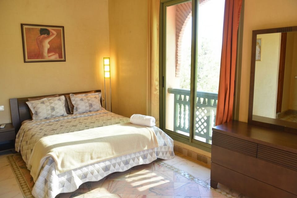 Cozy Bedroom with Balcony Access