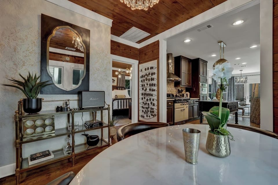 Whether you’re sipping your morning coffee or winding down after exploring SOCO, this welcoming living room is made for comfort.