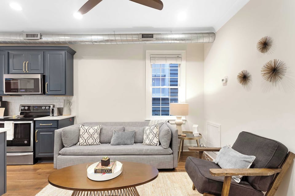 Open-concept living and kitchen area designed for relaxing and gathering.