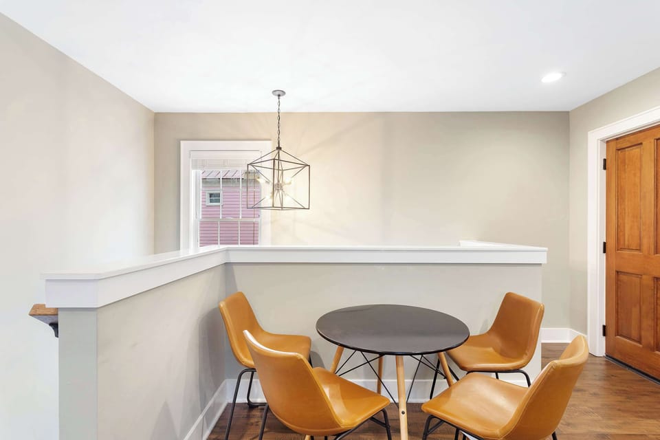Dining area with seating for four, perfect for shared meals and conversation.