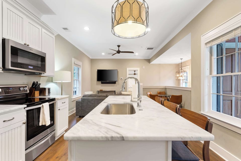 Kitchen island with bar seating for three, perfect for casual dining and conversation.