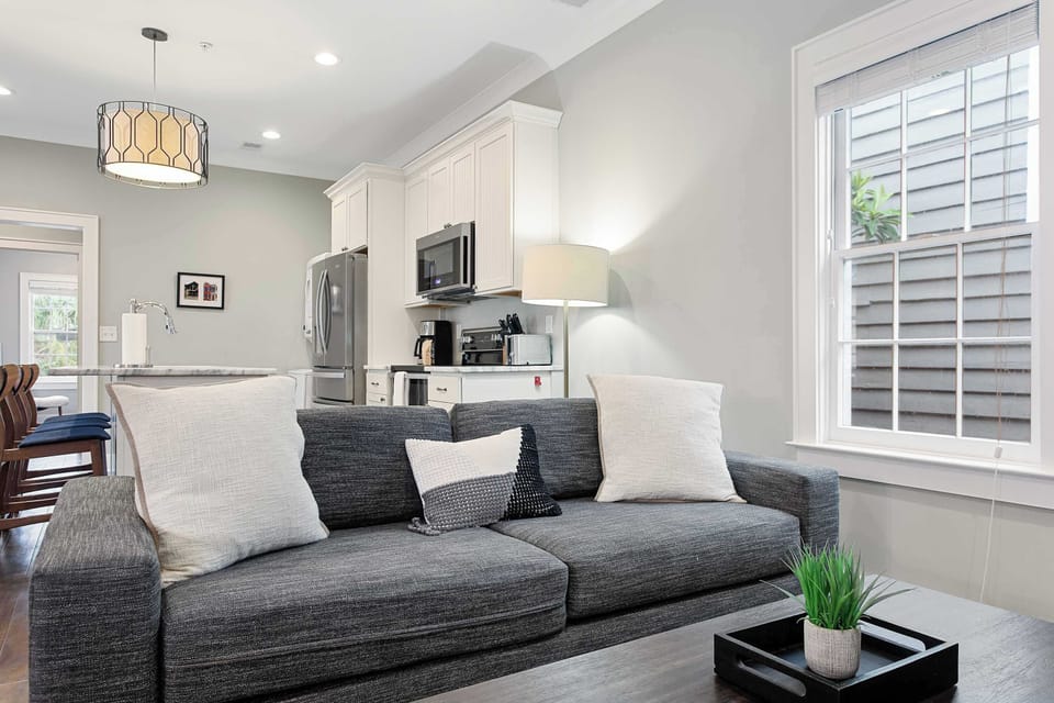 A welcoming living space with a TV and sleeper sofa for extra sleeping accommodations.