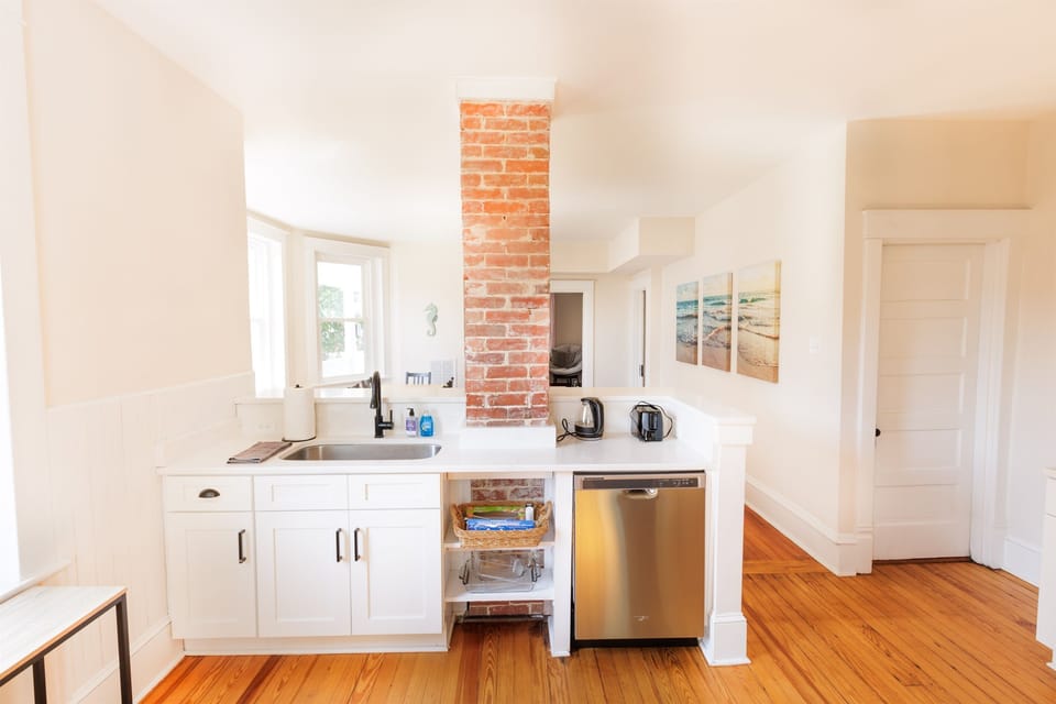 Spacious kitchen with modern appliances, essentials.