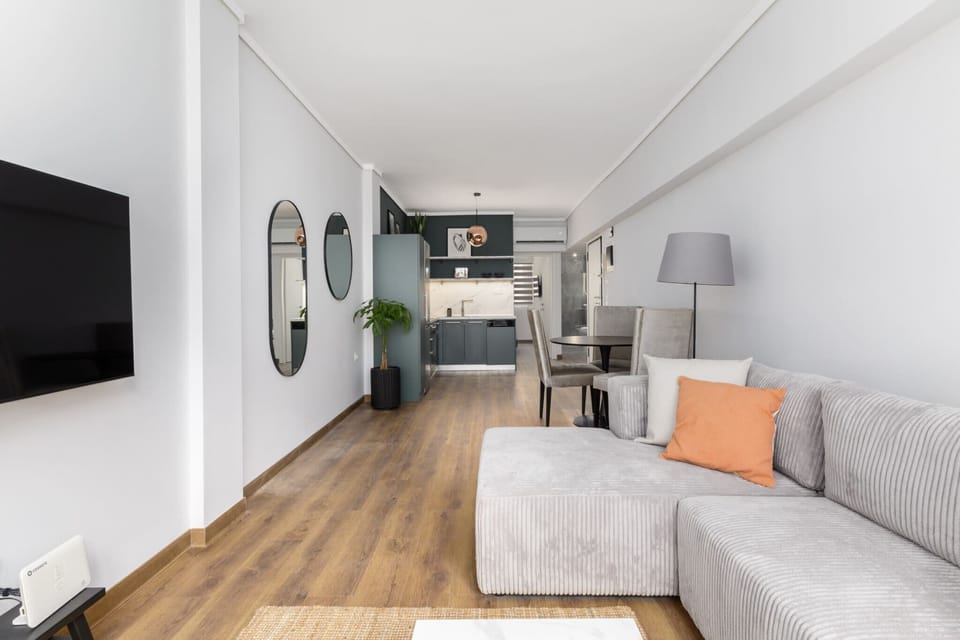 Apartment, 1 Queen Bed with Sofa bed | Living area | 40-inch Smart TV with digital channels