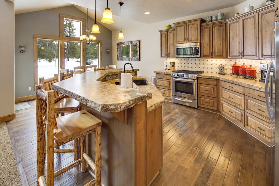 Lots of natural light show the beautiful granite counters