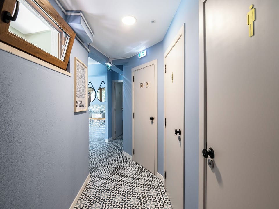 Shower, rainfall showerhead, hair dryer, towels