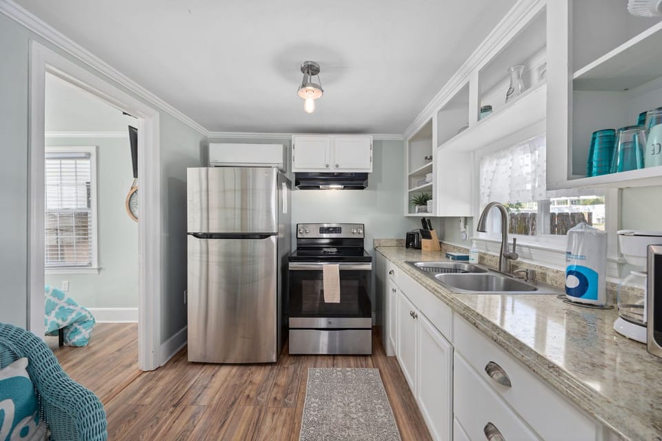 A chef-friendly space with sleek granite and stainless steel touches!
