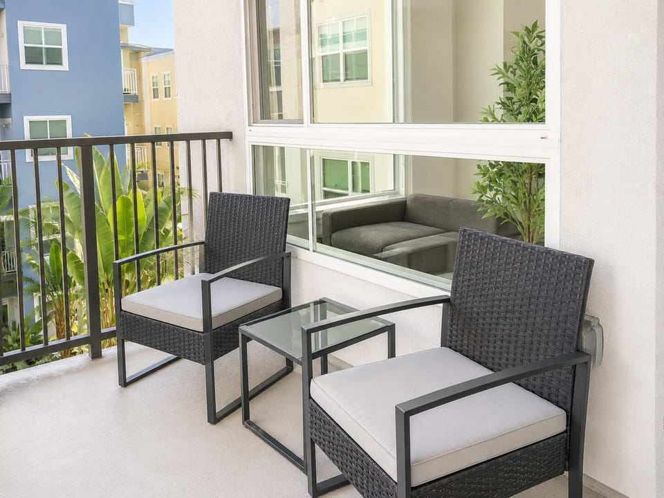 Enjoy stunning views of the iconic city from your own private balcony