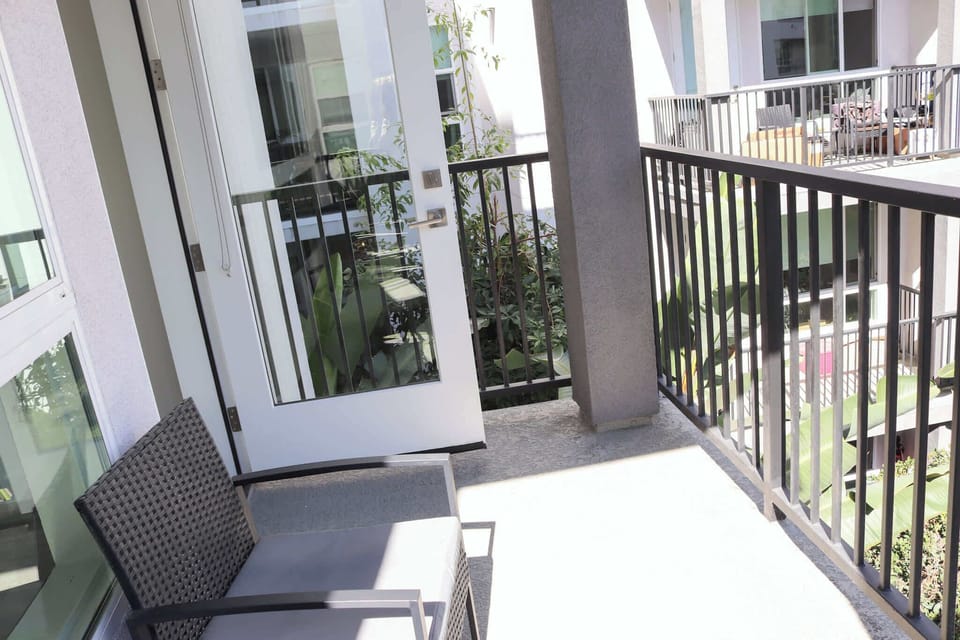 Enjoy stunning views of the iconic city from your own private balcony