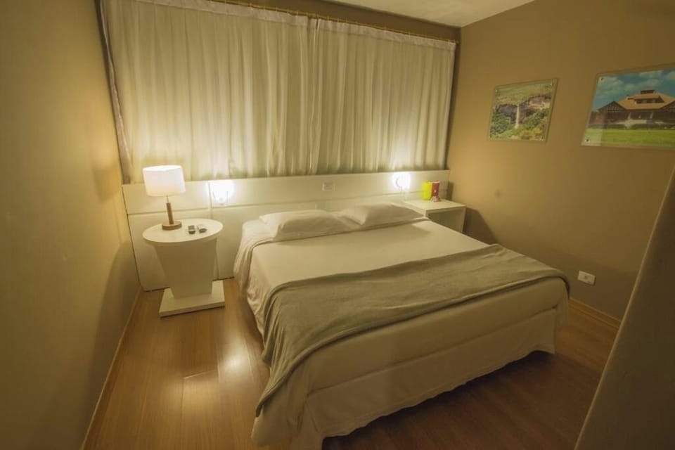 Recharge in a cozy retreat with warm evening lighting.