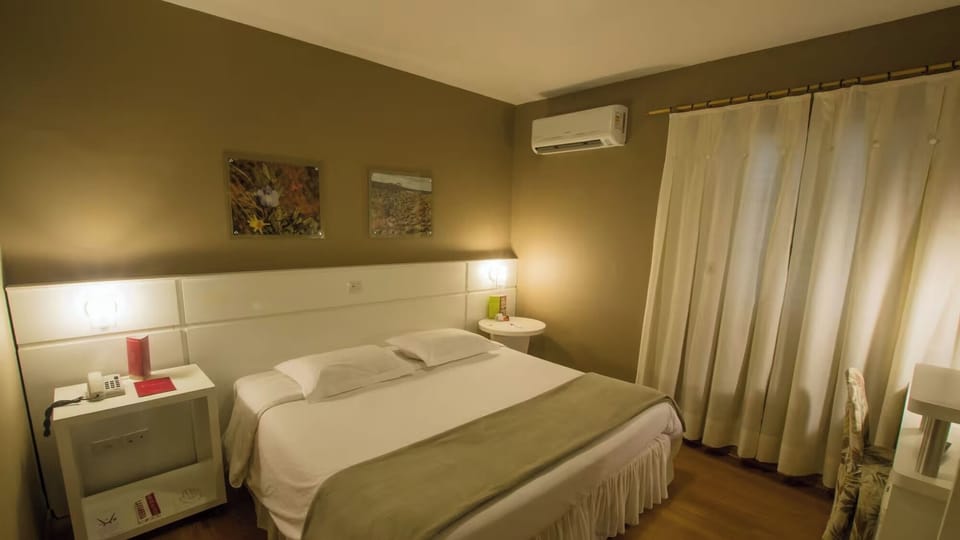 Cool down comfortably with air-conditioning and blackout curtains.