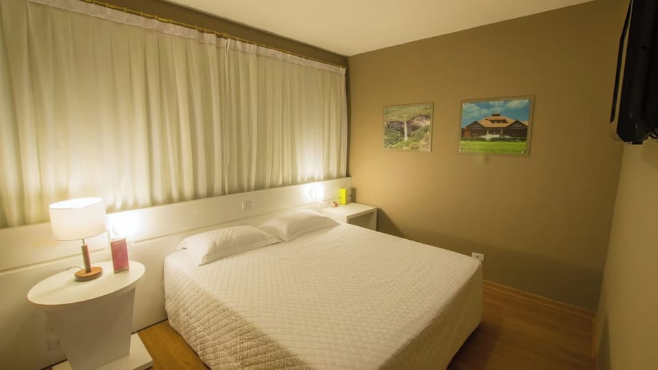 Unwind in a calm, softly lit double room.