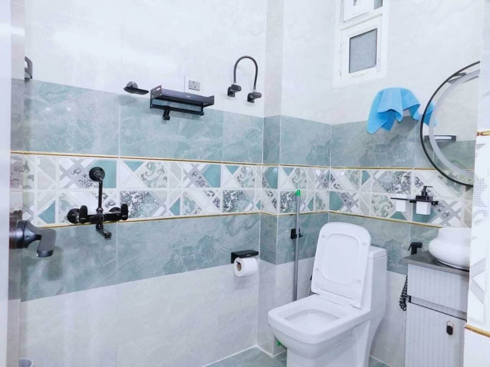 Luxury Apartment, Lanai, Courtyard View | Bathroom | Combined shower/tub, free toiletries, bathrobes, slippers