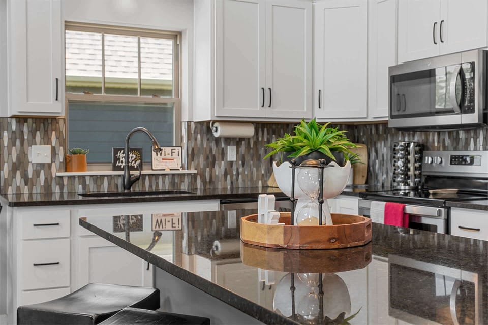 The open kitchen offers ample space & all the comforts of home​