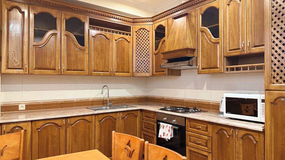 Luxury Apartment, 2 Bedrooms, 2 Bathrooms, Courtyard View | Private kitchen | Fridge, coffee/tea maker, electric kettle, cookware/dishes/utensils