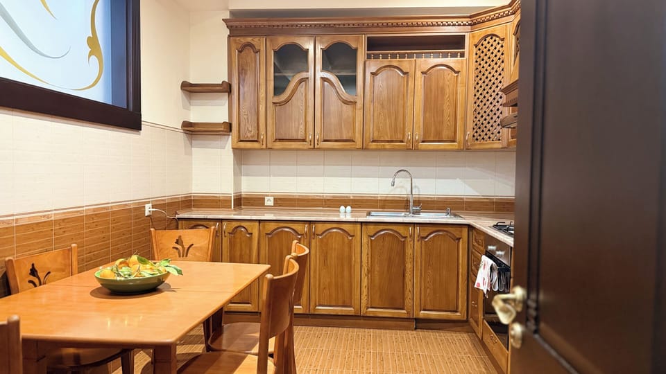 Luxury Apartment, 2 Bedrooms, 2 Bathrooms, Courtyard View | Private kitchen | Fridge, coffee/tea maker, electric kettle, cookware/dishes/utensils