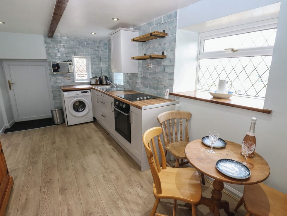 Fridge, microwave, toaster, cookware/dishes/utensils