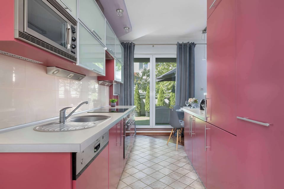 The kitchenette's practical layout maximizes space and functionality.