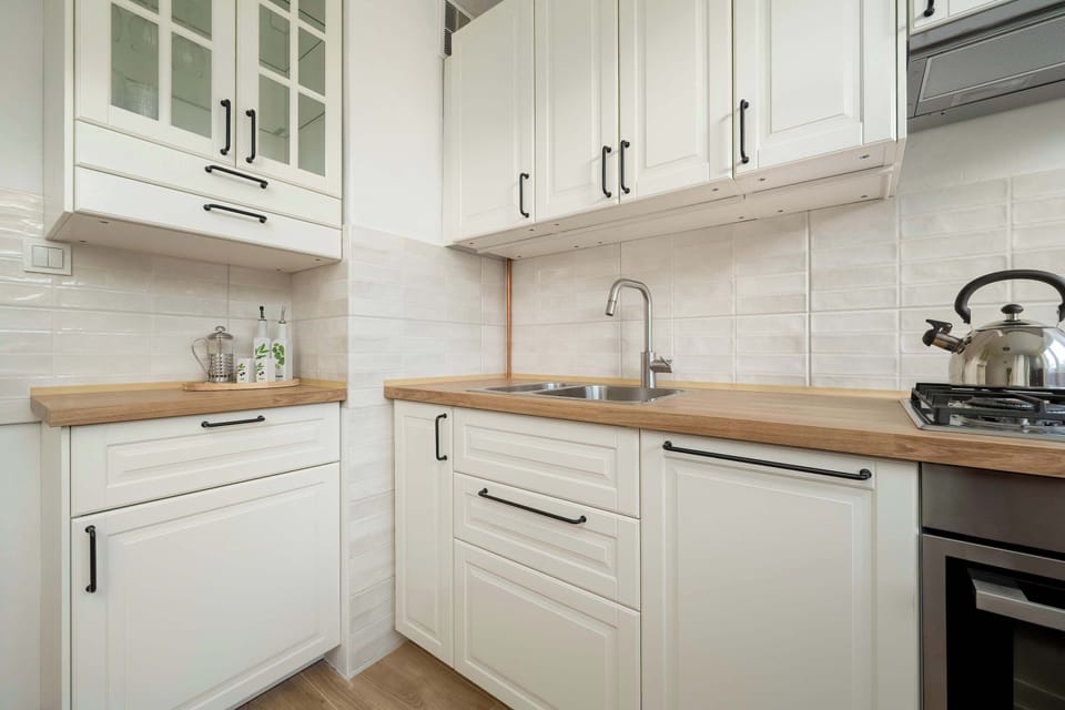The fully equipped kitchenette includes everything you need for a home-cooked meal.