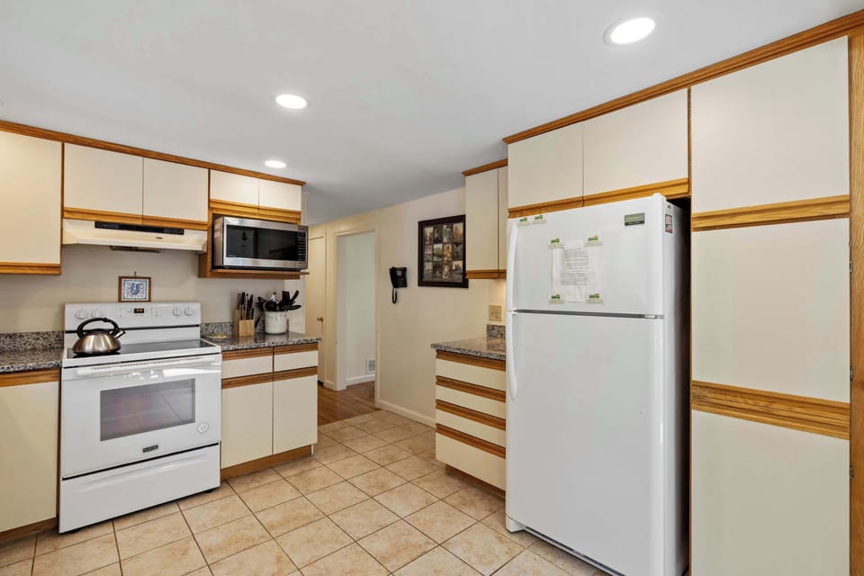 Fully equipped kitchen with modern appliances and plenty of counter space