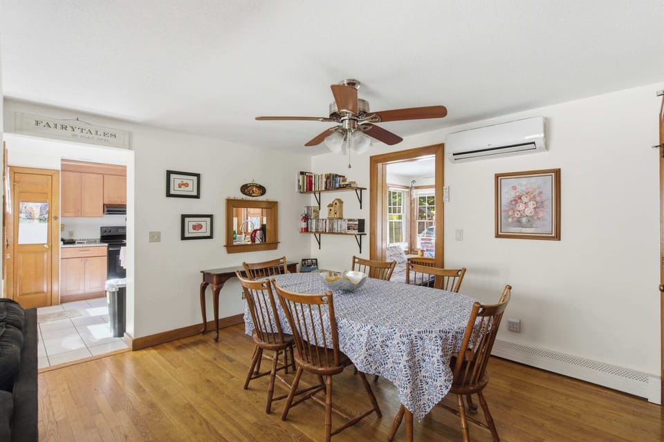 Dining area with seating for family meals after a day at the beach.