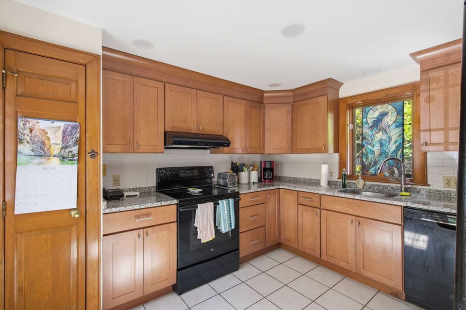 Fully equipped kitchen with plenty of counter space and storage.