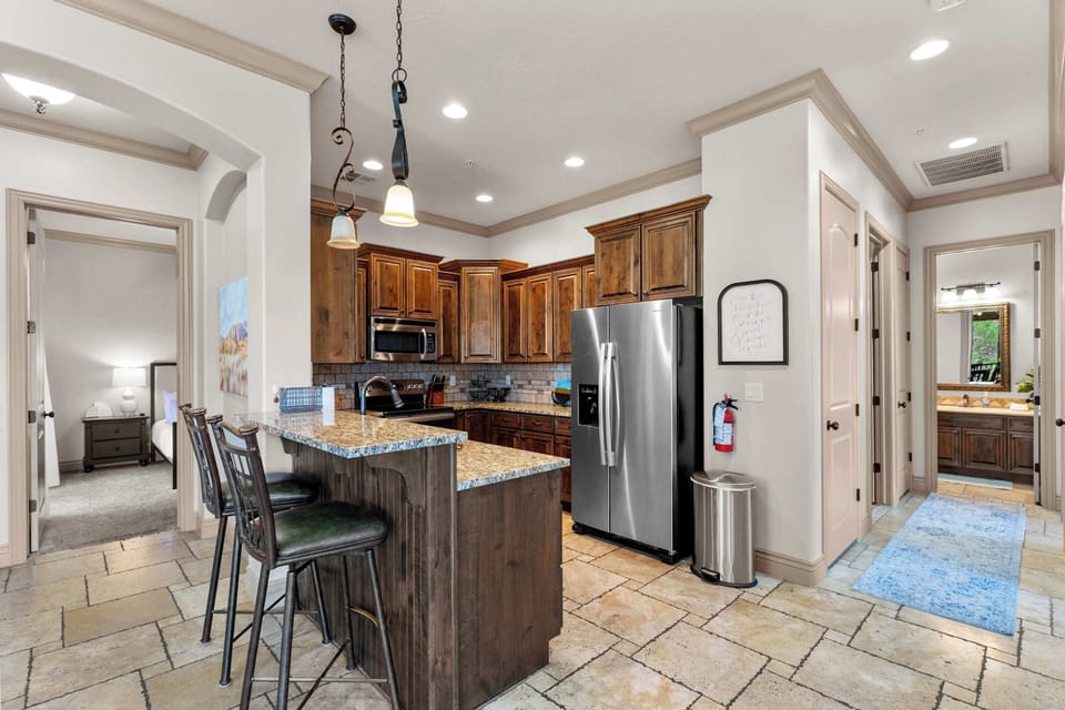 The open kitchen offers ample space & all the comforts of home​