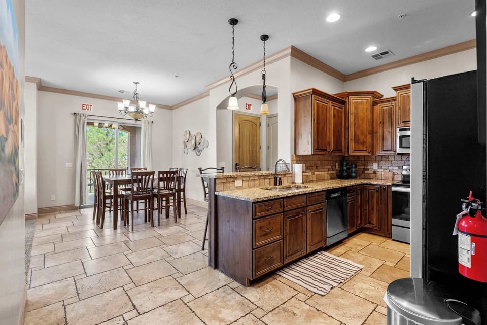 The open kitchen offers ample space & all the comforts of home​