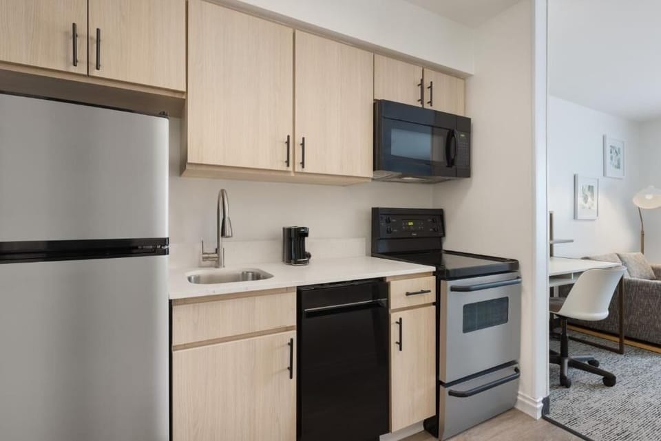Cook comfortably with full-size appliances and clean, modern finishes.