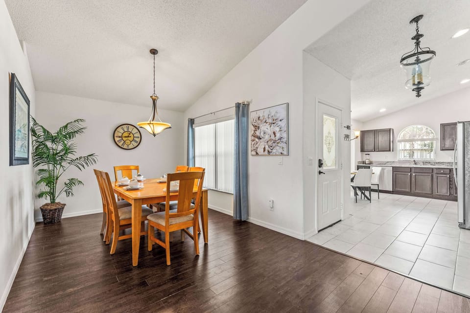 Formal dining area with table and seating for 6
