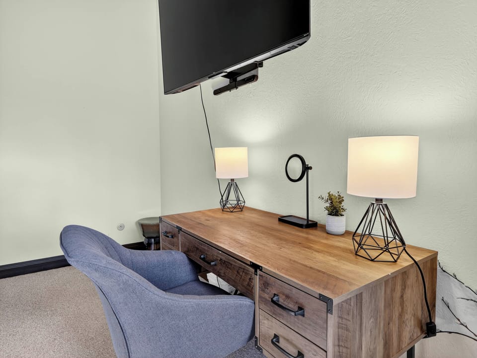 Work-friendly setup in the second bedroom with a dedicated workstation