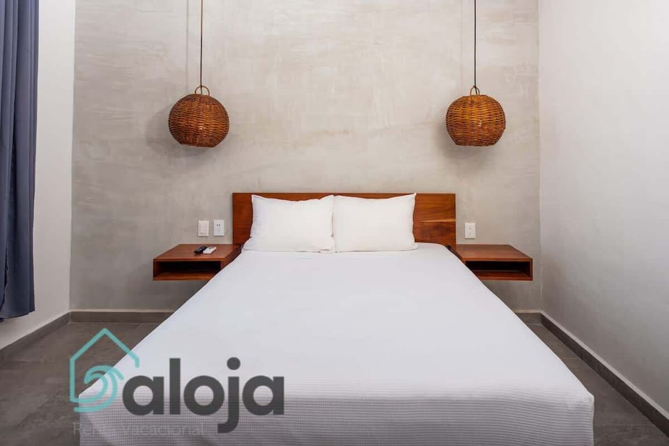 Recamara con cama queen size