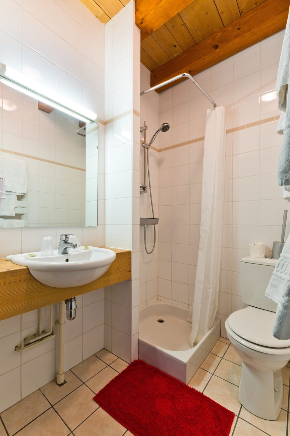 Shower, free toiletries, hair dryer, slippers