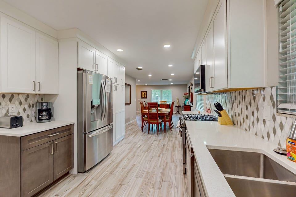 Fully equipped kitchen with appliances—ideal for extended stays and family meals.