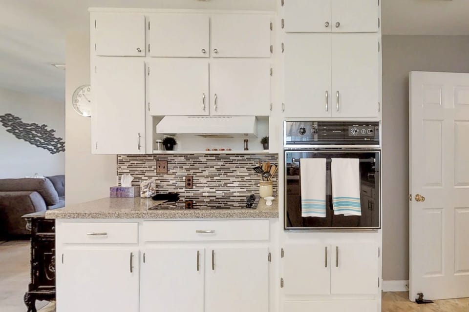 Fully equipped kitchen with appliances—ideal for extended stays and family meals.