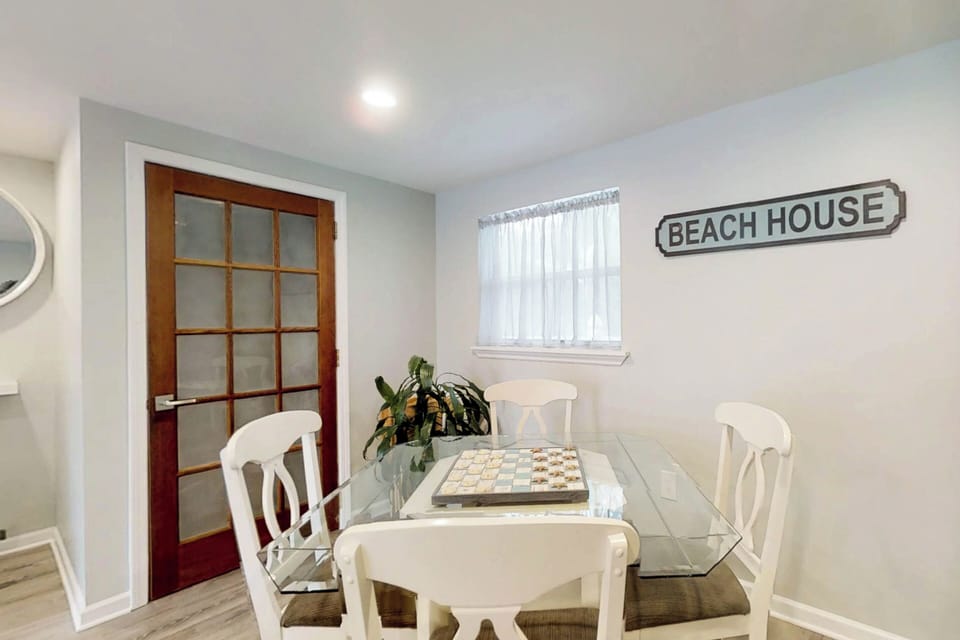 Inviting family room with a game table—perfect for relaxing, gathering, and enjoying fun nights in.