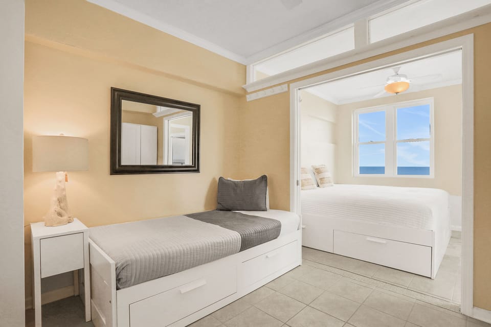 Pocket sliding doors separate bedrooms for immediate privacy.
