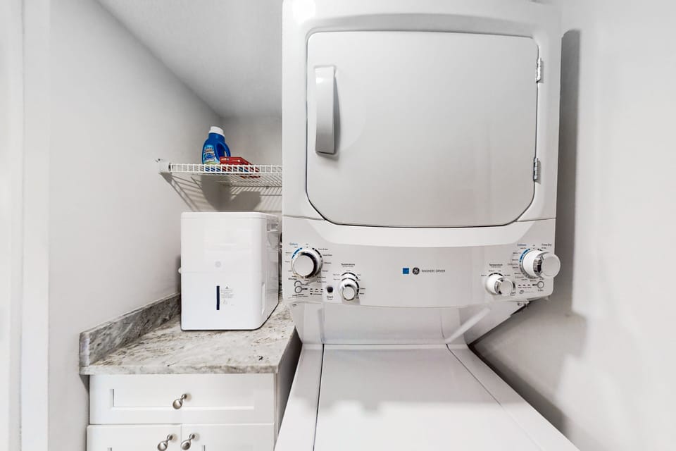 Enjoy the convenience of an in-unit washer and dryer, ideal for refreshing clothes after a day at the beach.