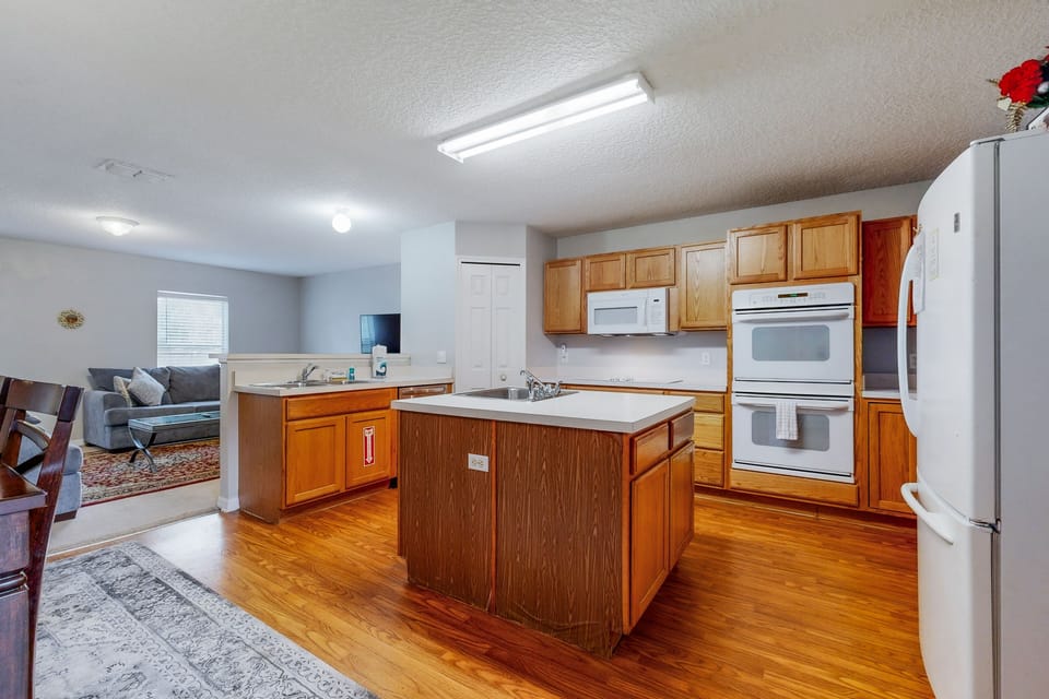 Fully equipped kitchen with appliances—ideal for extended stays and family meals.