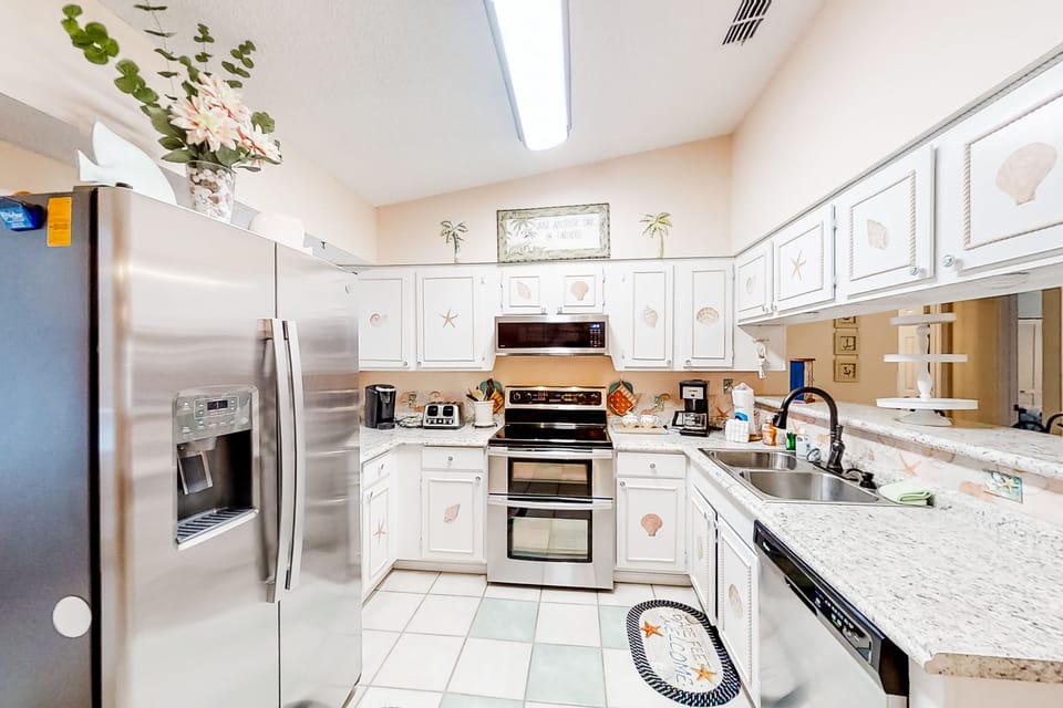 Fully equipped kitchen with appliances—ideal for extended stays and family meals.