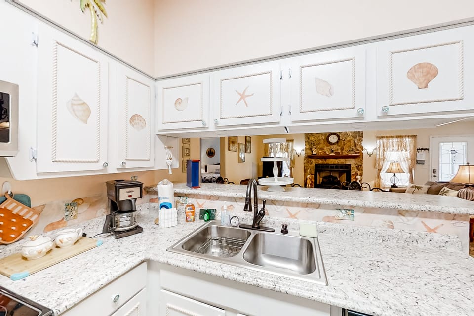 Fully equipped kitchen with appliances—ideal for extended stays and family meals.