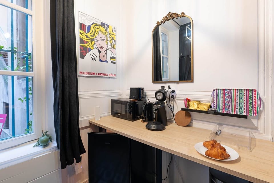 The kitchen, the microwave, the coffee machine