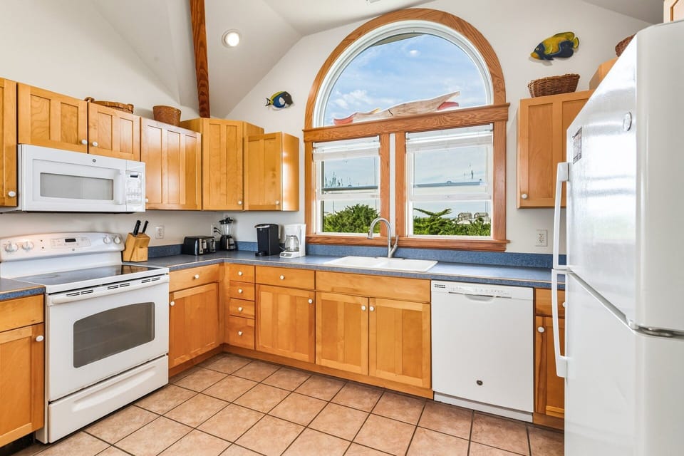Kitchen: Fully equipped kitchen with Keurig, crock pot, and griddle—perfect for vacation cooking.