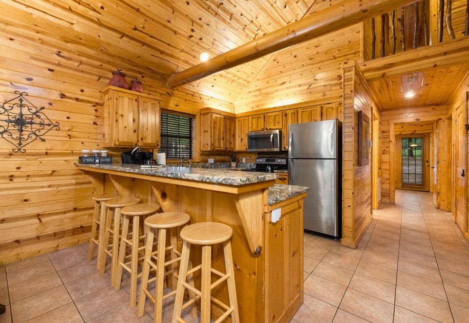 Bar seating in the kitchen for casual dining and morning coffee.