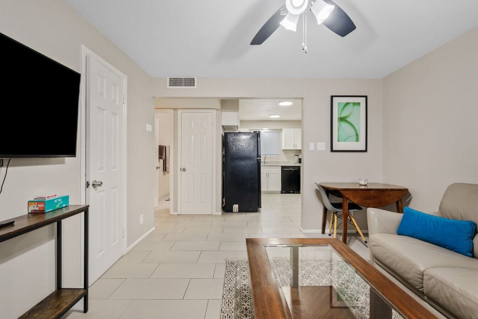Living room with dining table in the corner - view from front door